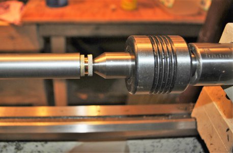 TURNING BARREL WITH BRASS BORE PROTECTOR.JPG