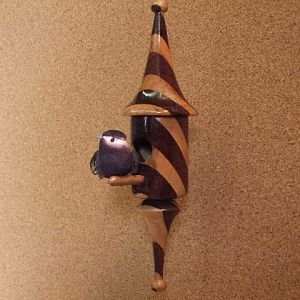 Walnut & Maple miniature birdhouse ornament.
