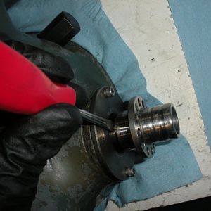 Installing the pinion shaft hub. It's easier if you hold the key in place with a screw driver as you slide the hub on.