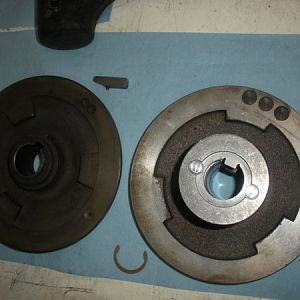 Next the motor fixed pulley and the variable pulley are to be installed. The variable disk on the right has been rebuilt/