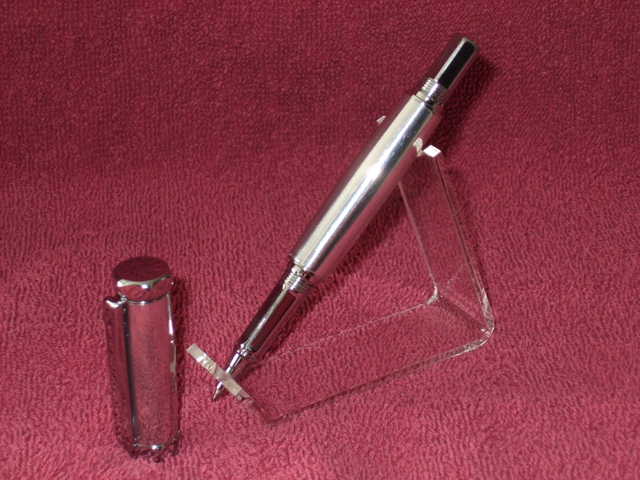 Aluminum body of this pen was the first time I turned metal on my wood lathe.